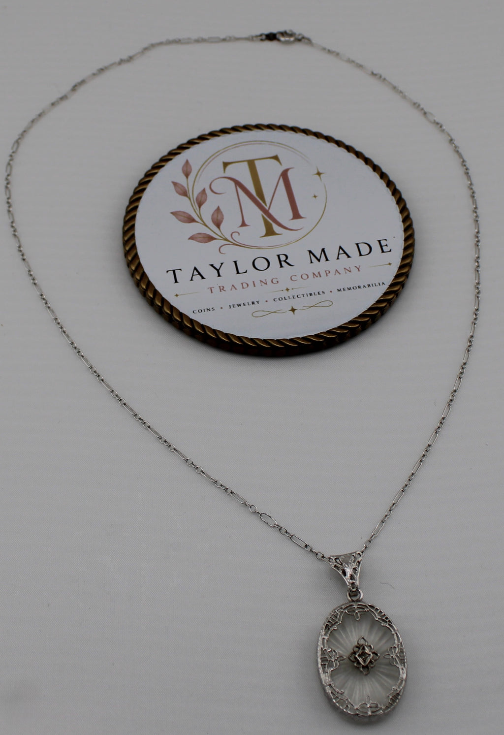 Art Deco Sterling Silver Camphor Glass Filigree Pendant Necklace - Full view with brand display