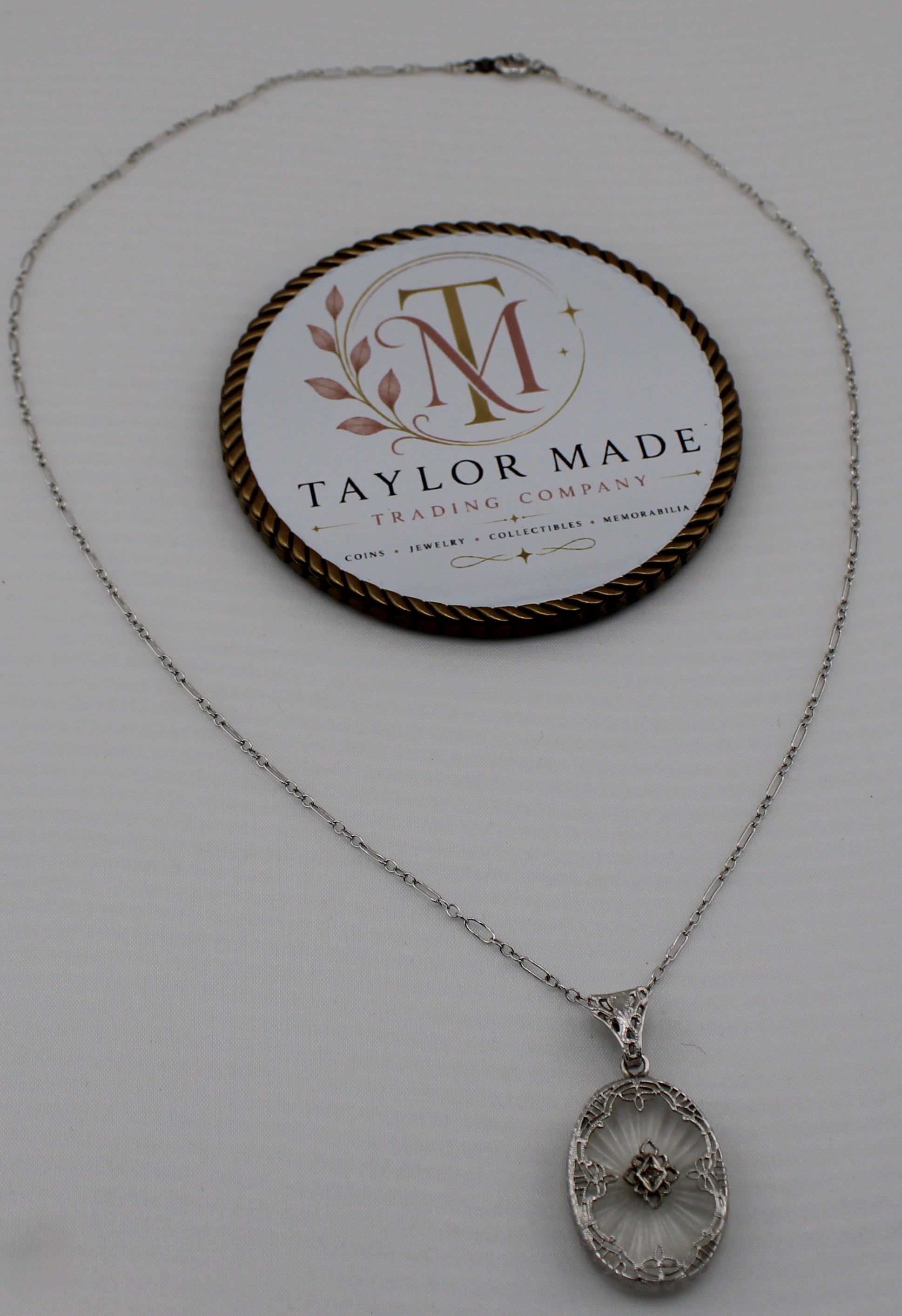 Art Deco Sterling Silver Camphor Glass Filigree Pendant Necklace - Full view with brand display