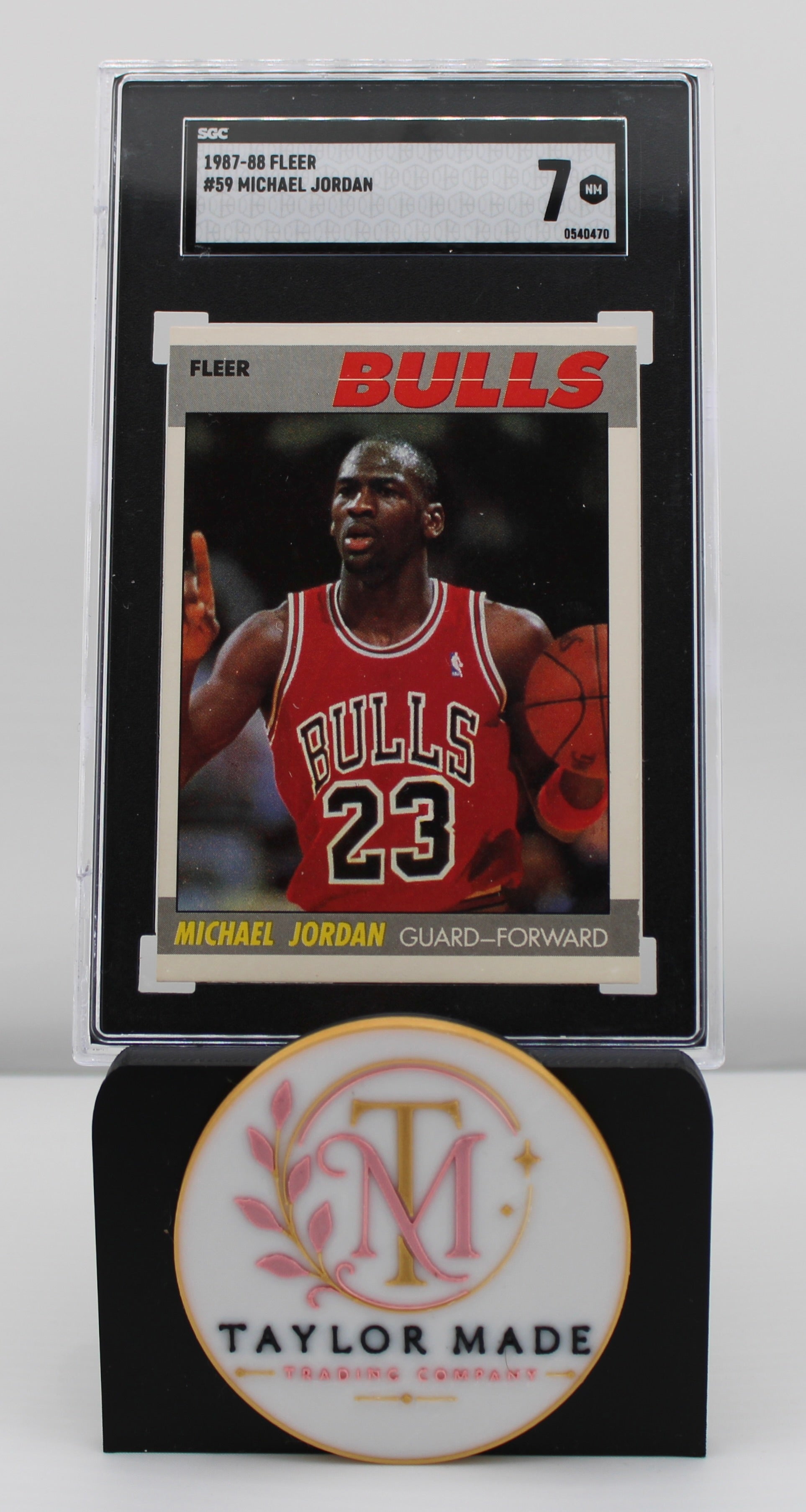 1987-88 Fleer #59 Michael Jordan SGC 7 NM Chicago Bulls - Card front defensive stance